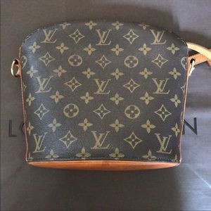 Louis Vuitton adjustable strap handbag